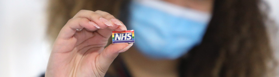 Equality and Diversity: Woman with Rainbow LGBT+ Badge