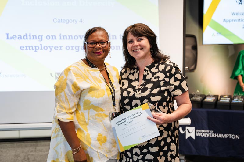 Maria Glover receiving her award
